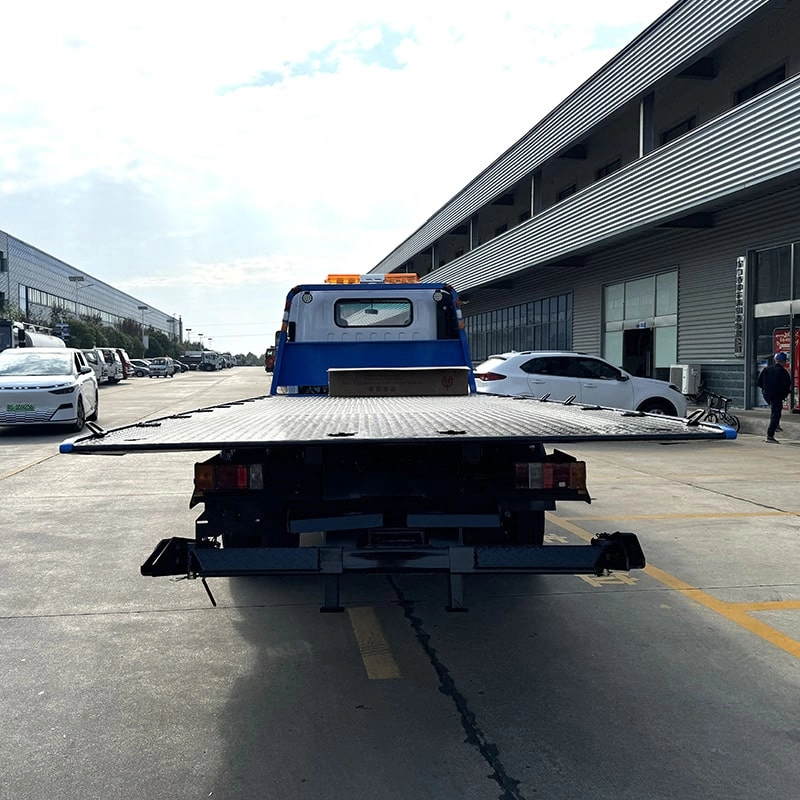 Isuzu Flatbed Wrecker Tow Truck Back View