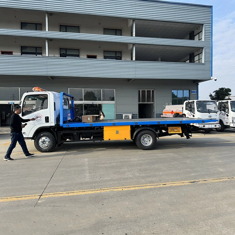 Isuzu Rollback Flatbed Wrecker Side View